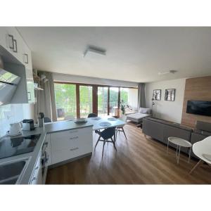 Kuchyň nebo kuchyňský kout v ubytování Lipno Port Apartment C101