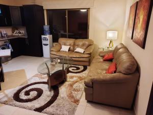 Zona de estar de Furnished apartment for rent In Abdoun شقة مفروشة للايجار في عبدون