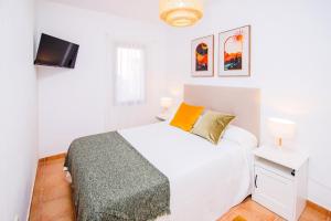 A bed or beds in a room at Villa Tropical Private Pool Capellania By Holidays Home
