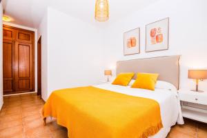 A bed or beds in a room at Villa Tropical Private Pool Capellania By Holidays Home