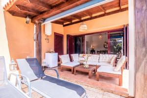 A seating area at Villa Tropical Private Pool Capellania By Holidays Home