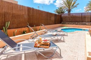 The swimming pool at or close to Villa Tropical Private Pool Capellania By Holidays Home