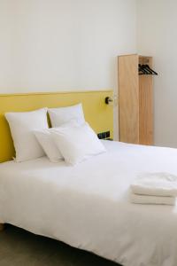 Letto o letti in una camera di Le Lieu Dit
