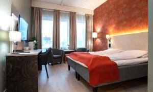 Postel nebo postele na pokoji v ubytování Thon Partner Hotel Sortland