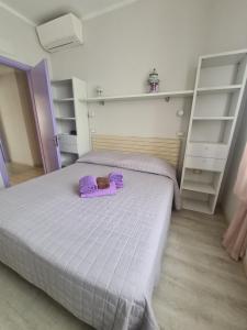 Postel nebo postele na pokoji v ubytování Sara by PortofinoVacanze