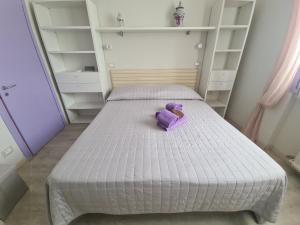 Postel nebo postele na pokoji v ubytování Sara by PortofinoVacanze