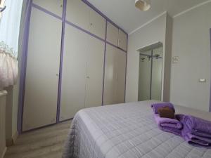 Postel nebo postele na pokoji v ubytování Sara by PortofinoVacanze