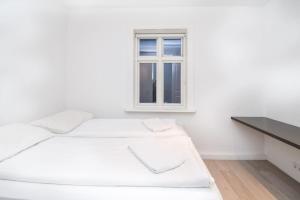 Postel nebo postele na pokoji v ubytování City Point Reykjavik - Luxury Apartments - Surtsey
