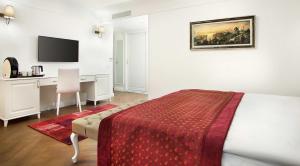 Postel nebo postele na pokoji v ubytování Astan Hotel Galata