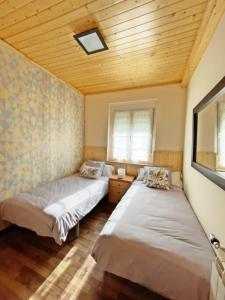 Ένα ή περισσότερα κρεβάτια σε δωμάτιο στο Apartamentos La Capitana +76 φωτογραφίες