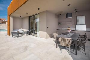 Posezení v ubytování Design Villa Palmeta