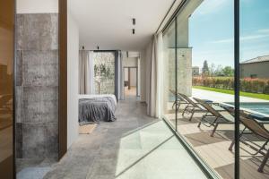 Balkón nebo terasa v ubytování Design Villa Palmeta