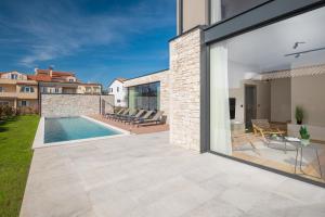Bazén v ubytování Design Villa Palmeta nebo v jeho okolí