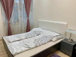 Posteľ alebo postele v izbe v ubytovaní Galaxy
