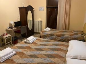 Postel nebo postele na pokoji v ubytování B&B Anna Fiera
