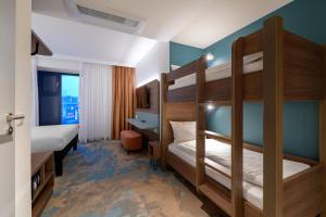 Postel nebo postele na pokoji v ubytování ibis Styles Kiel City
