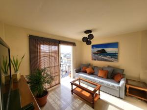 Posezení v ubytování Apartment next to Ajabo Beach Pool & Ocean view
