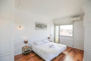 Posteľ alebo postele v izbe v ubytovaní Vieux-Port - Vue exceptionnelle - 3 ch et clim