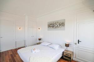 Posteľ alebo postele v izbe v ubytovaní Vieux-Port - Vue exceptionnelle - 3 ch et clim