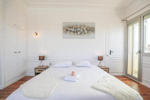 Posteľ alebo postele v izbe v ubytovaní Vieux-Port - Vue exceptionnelle - 3 ch et clim