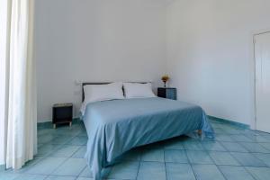 Cama ou camas em um quarto em Albergo La Prora