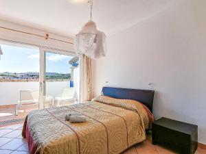 Posteľ alebo postele v izbe v ubytovaní Vigna Marina Apartments + 37 fotografií