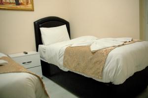 Postel nebo postele na pokoji v ubytování Tolga Hotel