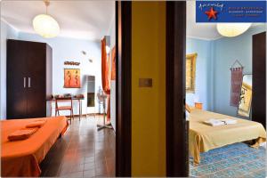 Postel nebo postele na pokoji v ubytování B&B Asteroidea
