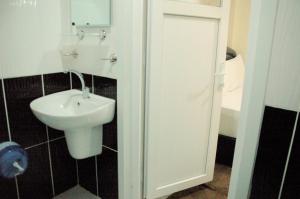 Koupelna v ubytování Tolga Hotel