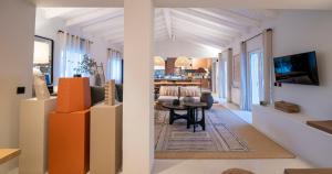 Un televizor și/sau centru de divertisment la Az Ribat Sea e Sun