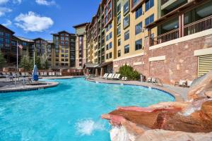 a swimming pool in the middle of a building at Grand Summit Lodge by Park City - Canyons Village in Park City