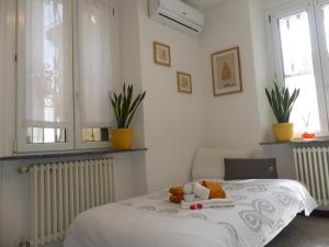 Łóżko lub łóżka w pokoju w obiekcie [VILLA LECCO] FREE Wi-Fi, Parking & Bike Service