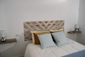 Posteľ alebo postele v izbe v ubytovaní Casa playa Torre del mar- HOME RENT MALAGA
