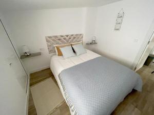 Posteľ alebo postele v izbe v ubytovaní Casa playa Torre del mar- HOME RENT MALAGA