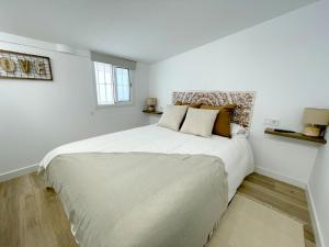 Posteľ alebo postele v izbe v ubytovaní Casa playa Torre del mar- HOME RENT MALAGA