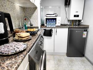 Kuchyň nebo kuchyňský kout v ubytování Back in 1908.