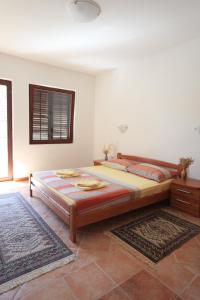 Posteľ alebo postele v izbe v ubytovaní Apartments Pinus