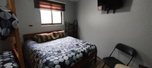 EL ROBLE 2.0 CHILLAN房間的床