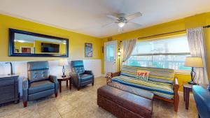 a living room with a couch and two chairs at SIV10 Beautiful Condo, Shared Pool, Close to Beach in Port Aransas