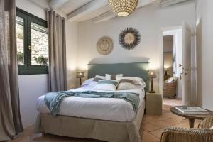 Postel nebo postele na pokoji v ubytování Boutique Hotel Solaz