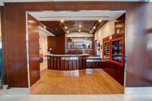 a lobby with a bar in the middle of a room at Fairfield Inn by Marriott New York Manhattan/Financial District in New York