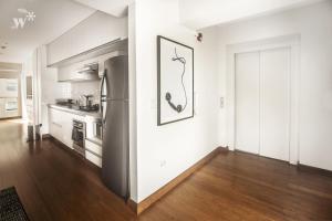 A cozinha ou cozinha compacta de Las Mimosas by Wynwood House