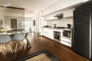 A cozinha ou cozinha compacta de Las Mimosas by Wynwood House