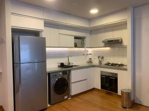 A cozinha ou cozinha compacta de Las Mimosas by Wynwood House