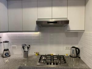 A cozinha ou cozinha compacta de Las Mimosas by Wynwood House