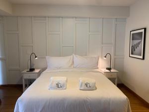 Cama ou camas em um quarto em Las Mimosas by Wynwood House