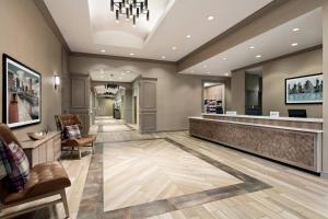 a hotel lobby with a reception desk and a waiting room at Residence Inn by Marriott Baltimore Downtown/ Inner Harbor in Baltimore