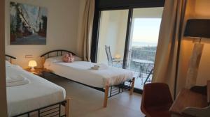 Posteľ alebo postele v izbe v ubytovaní Marbella Resort, Samara By Houselogy