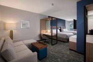 Кровать или кровати в номере SpringHill Suites by Marriott Amelia Island