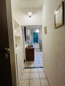 Kuchyň nebo kuchyňský kout v ubytování Casa L' Aurora Viola